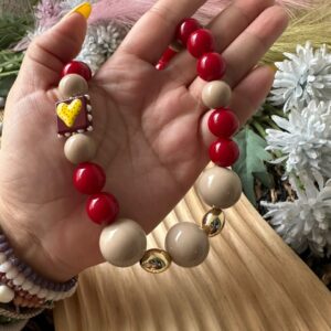 collar corazón amarillo